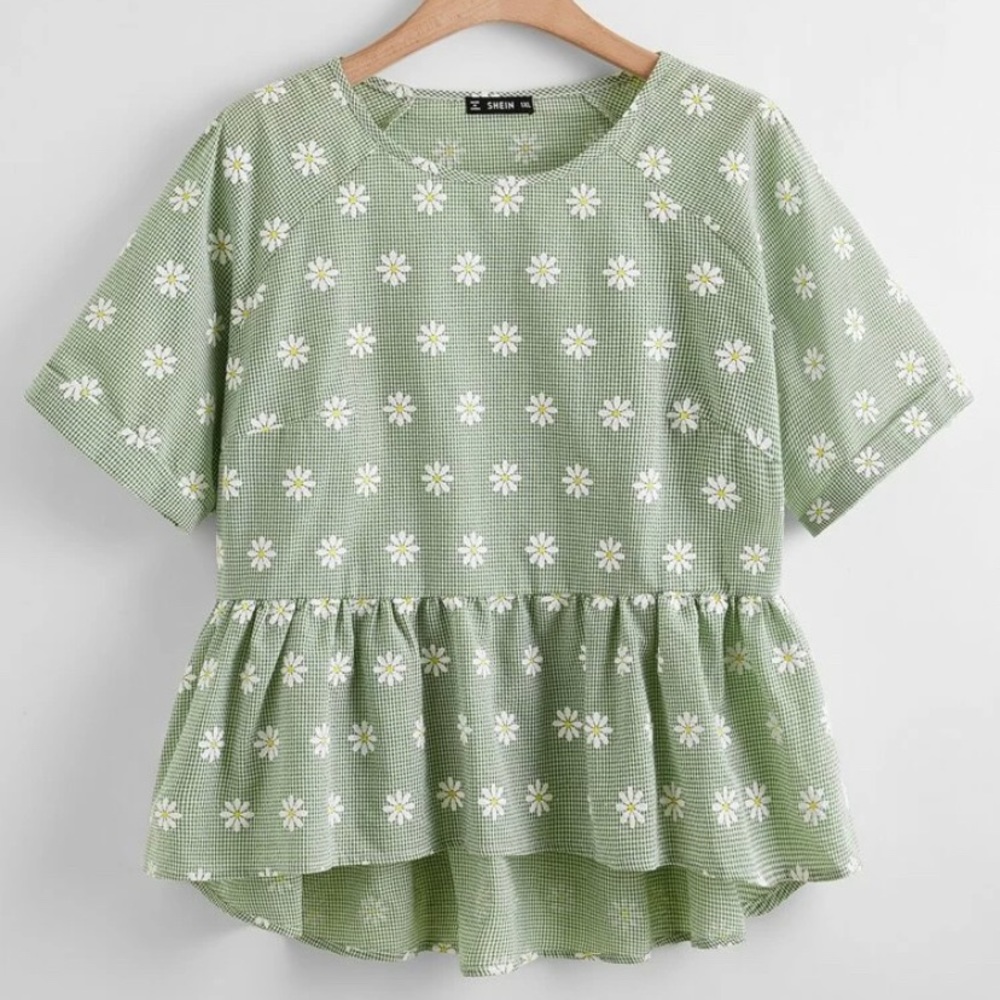 Green daisy peplum shirt